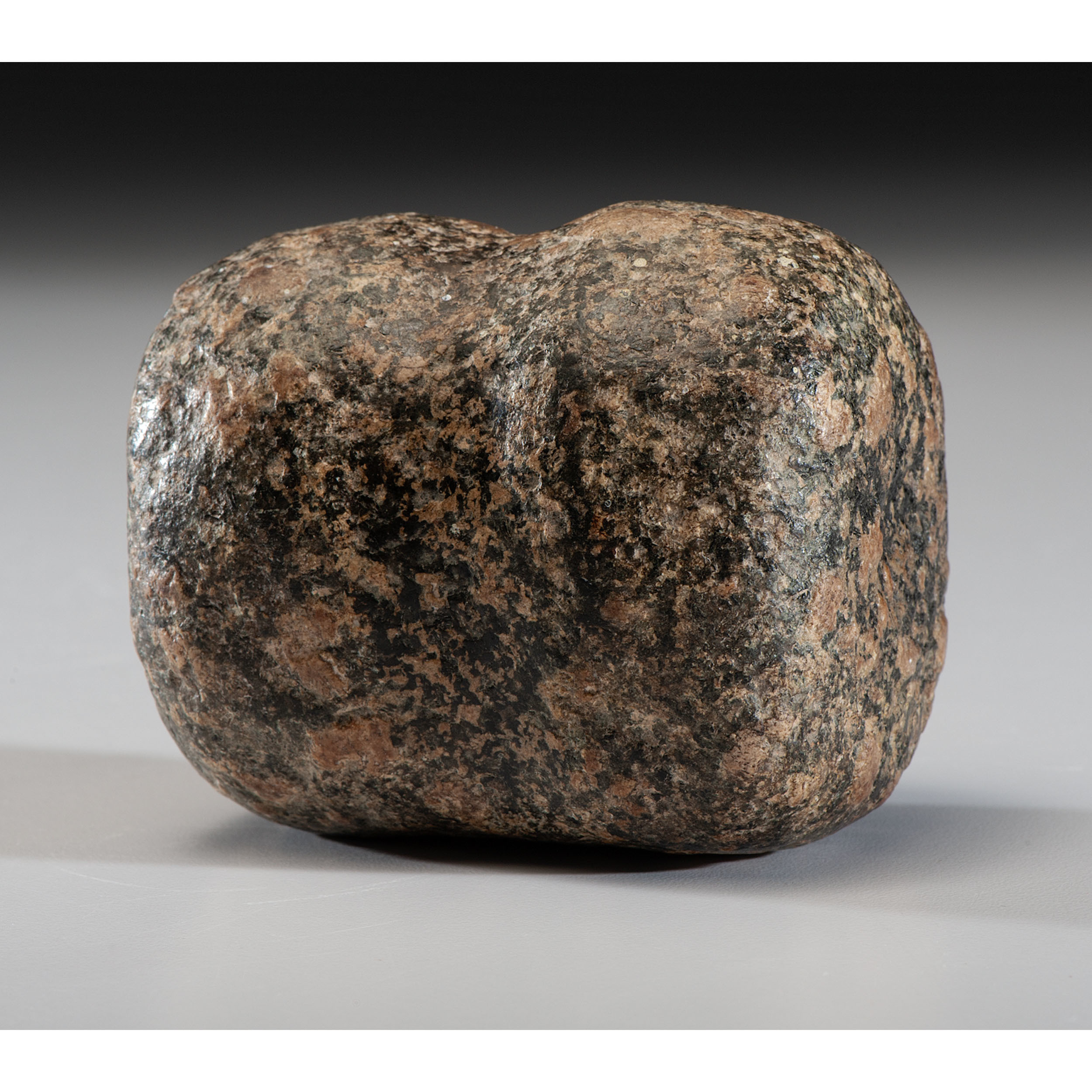 A Grooved Granite Hammerstone, 3 in. Cowan's Auction House The