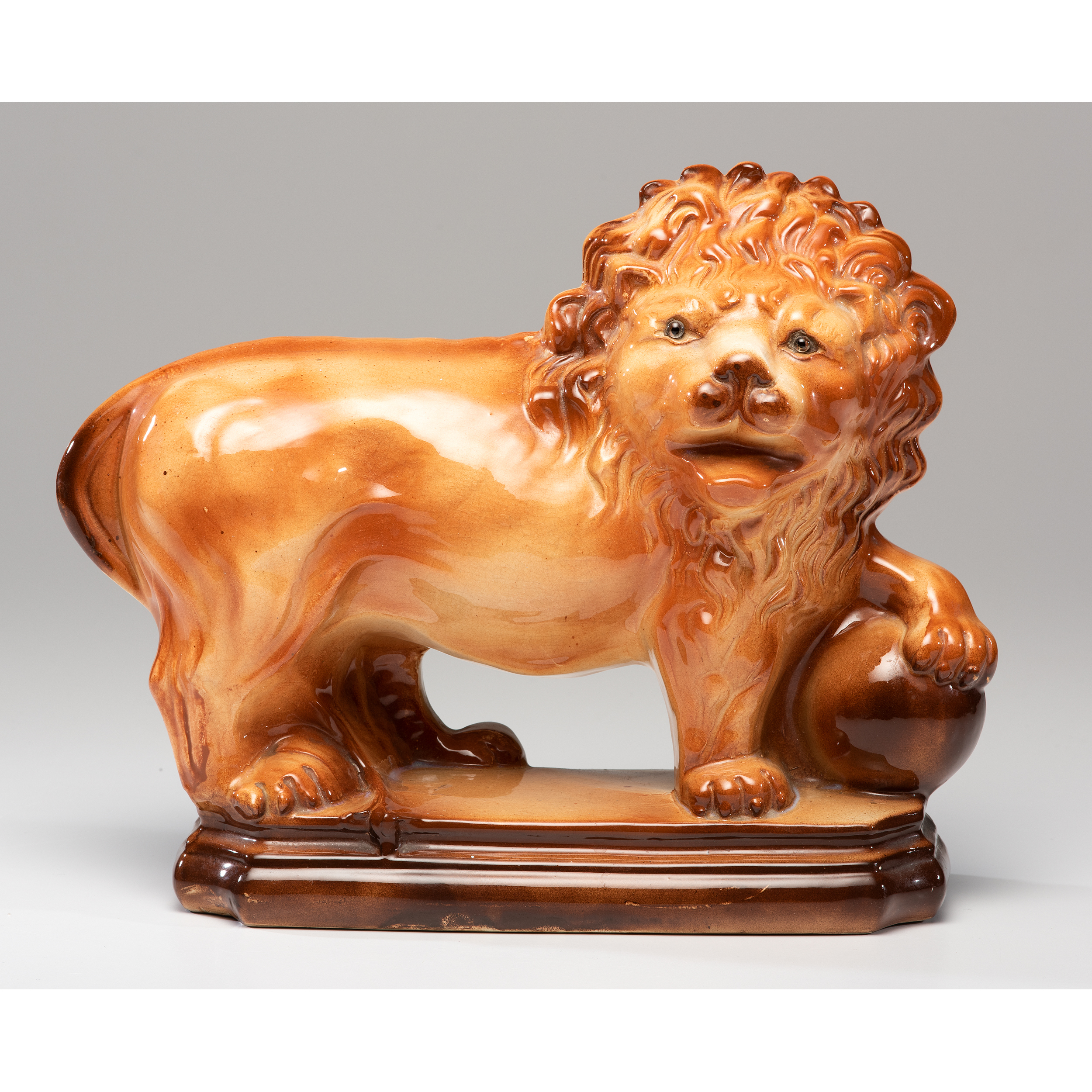 A Staffordshire Lion | Cowan's Auction House: The Midwest's Most